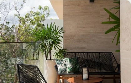 Covered private villa terrace and lush patio