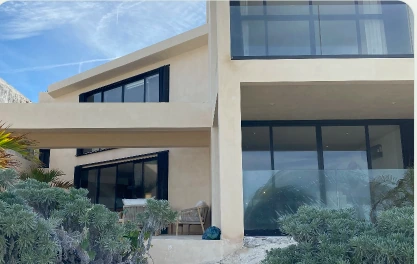 Full exterior of modern two-storey villa